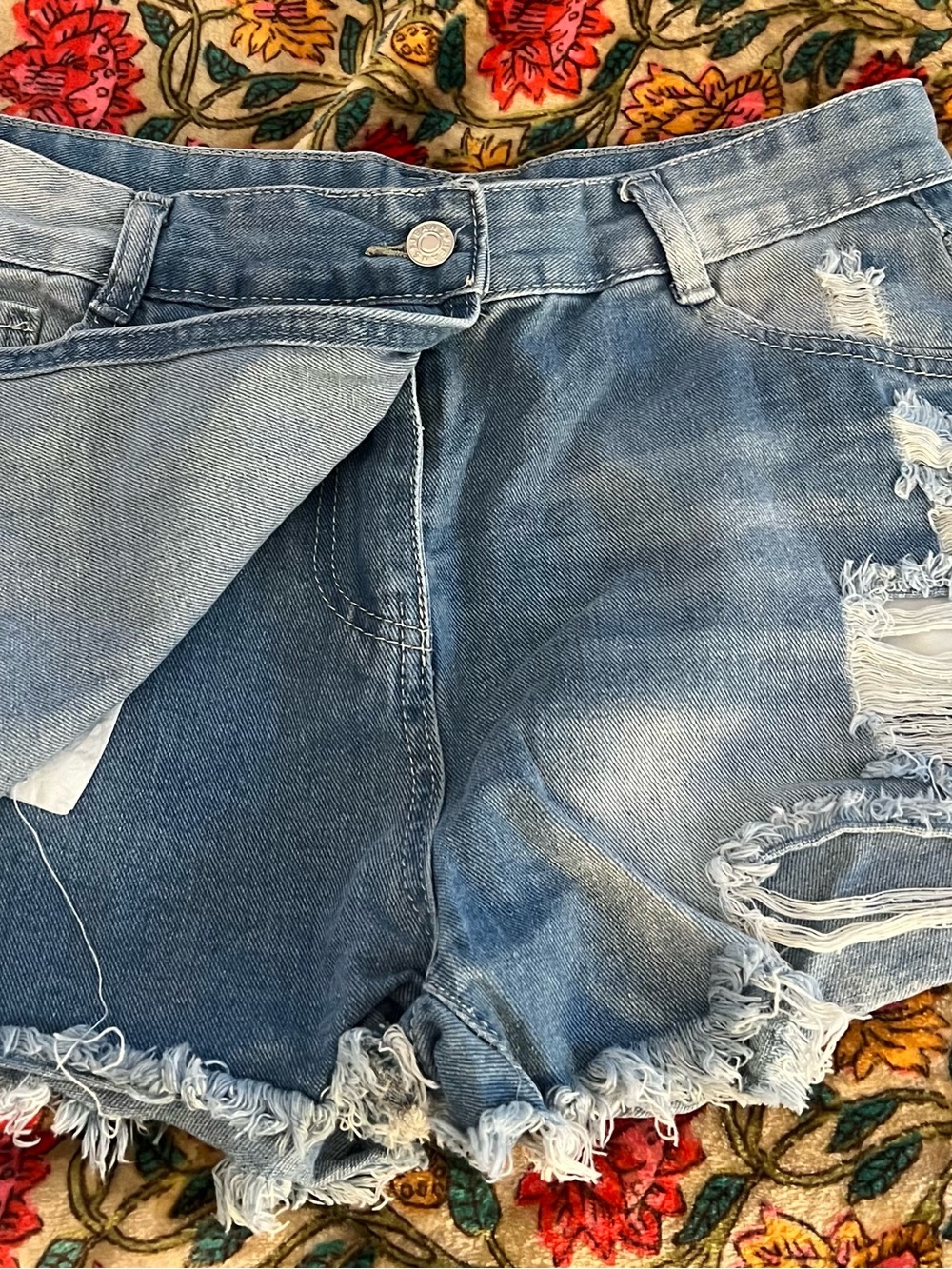 Women's Distressed Light Blue Denim Skort